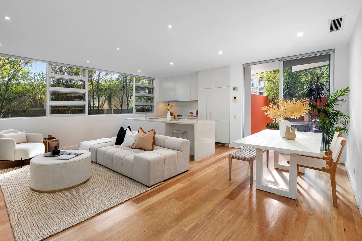 Large, bright living room with open concept layout leading to dining and kitchen areas - 1/70 Bradleys Head Road, Mosman, NSW 2088