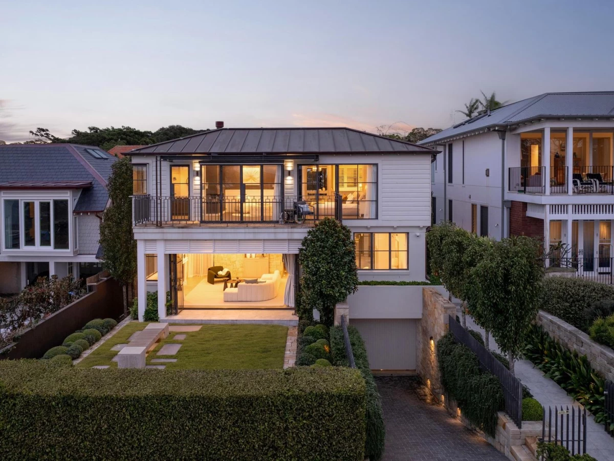 Rear view of a house with large windows and a spacious lawn - 10 Burrawong Avenue, Mosman, NSW 2088