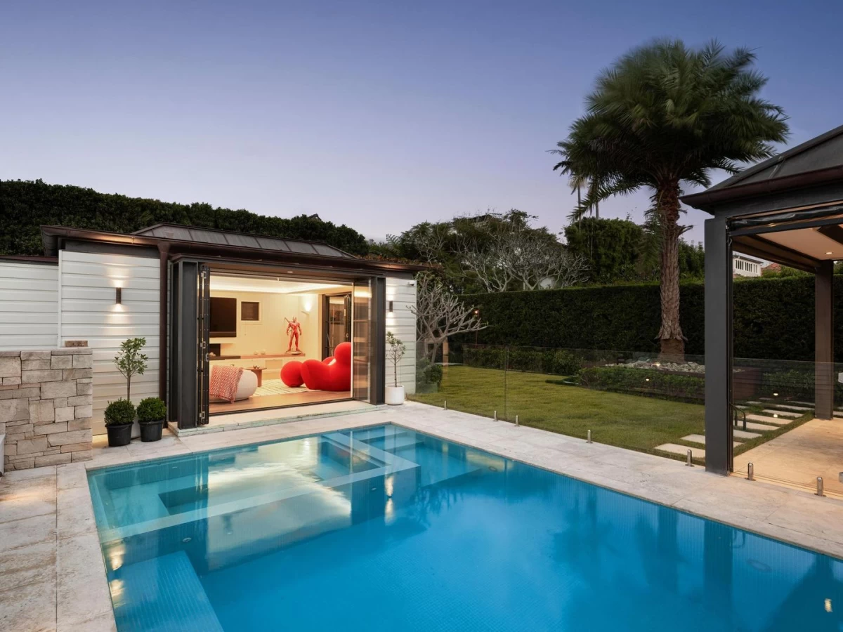 Pool area with pool house and surrounding greenery - 10 Burrawong Avenue, Mosman, NSW 2088