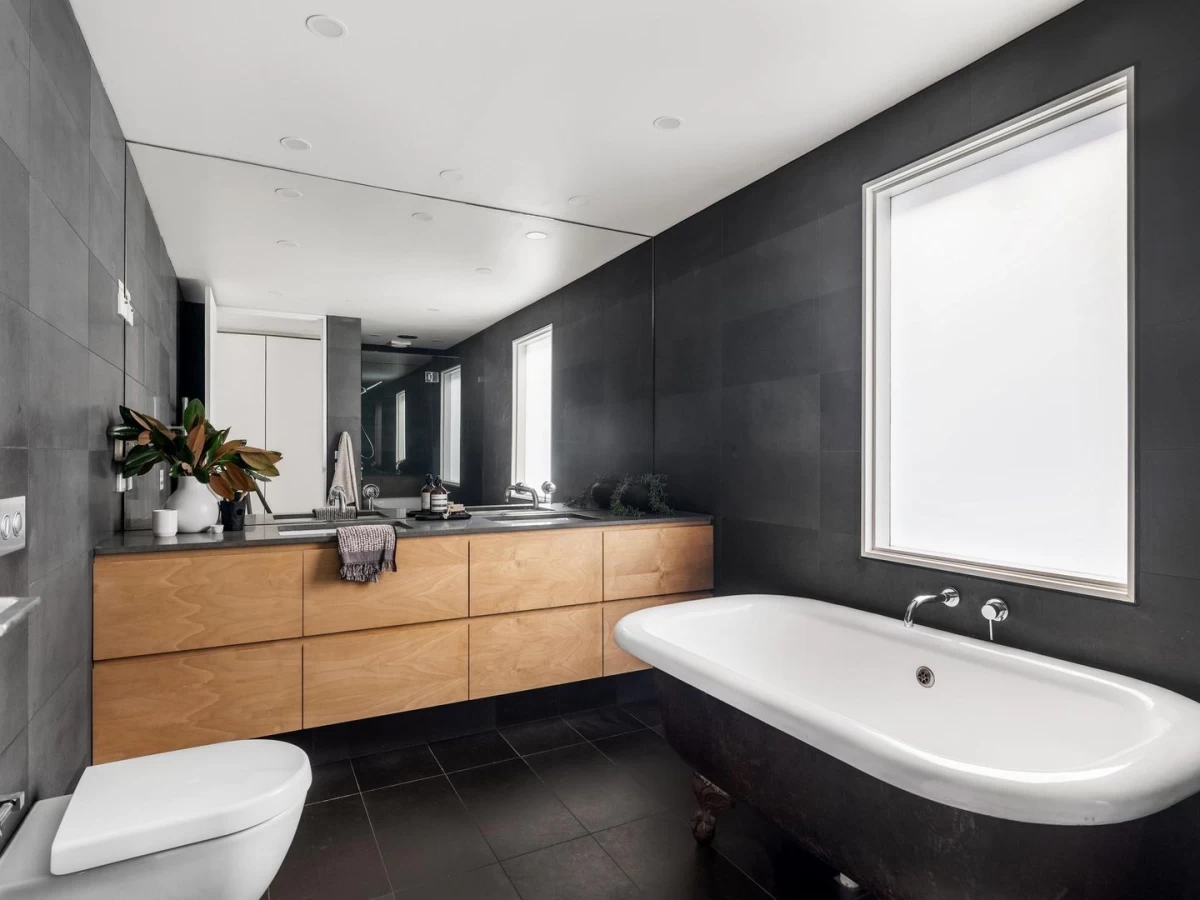 Modern bathroom with a large bathtub and ample storage - 10 Holt Avenue, Mosman, NSW 2088