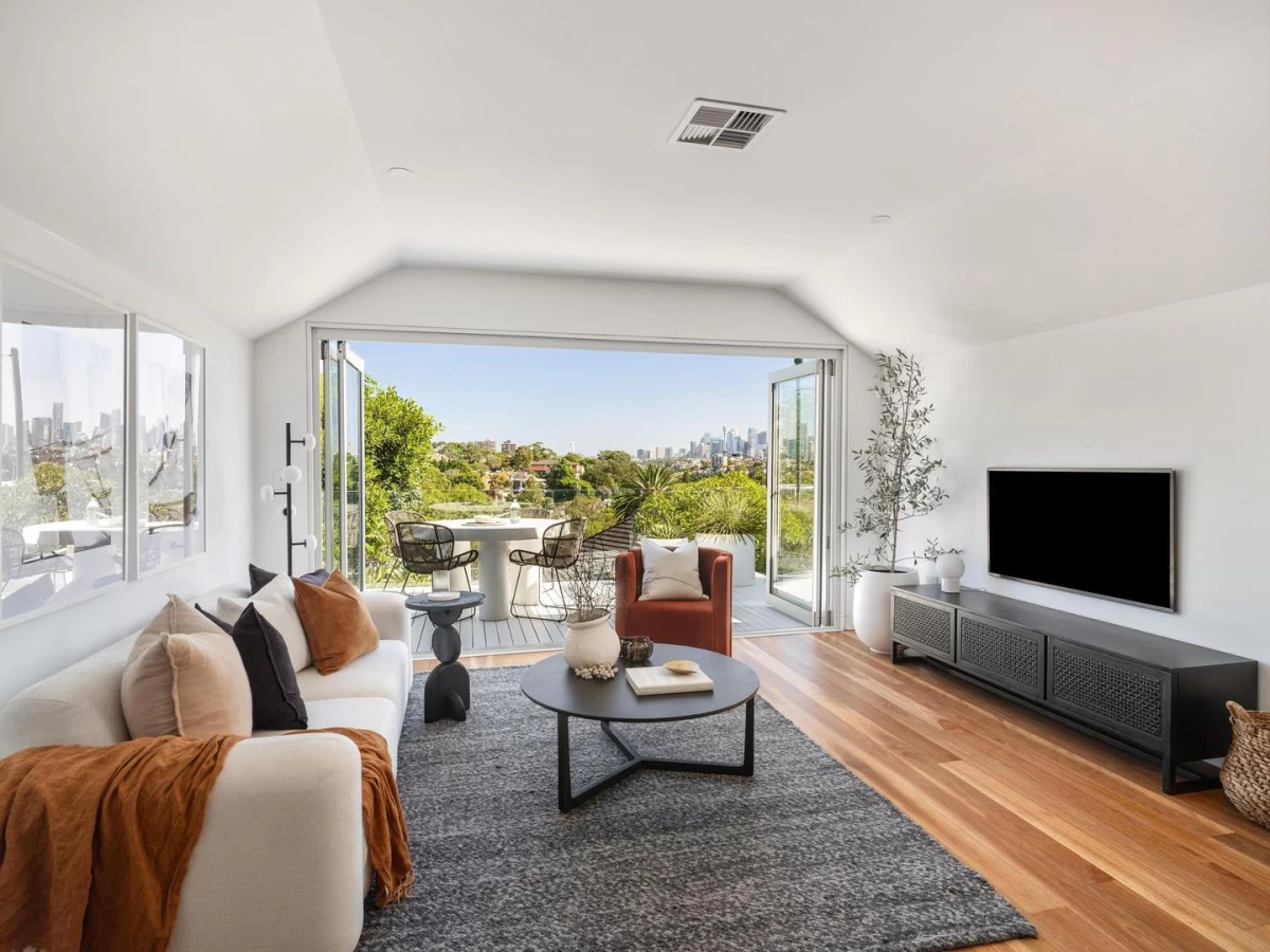 Spacious living room with large windows and connected balcony - 10 Holt Avenue, Mosman, NSW 2088