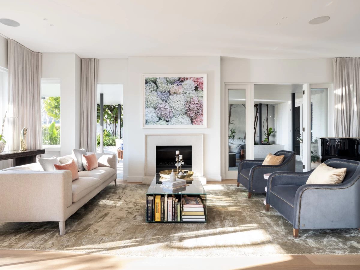 Spacious living room with a fireplace and large windows for natural light - 10 Redan Street, Mosman, NSW 2088