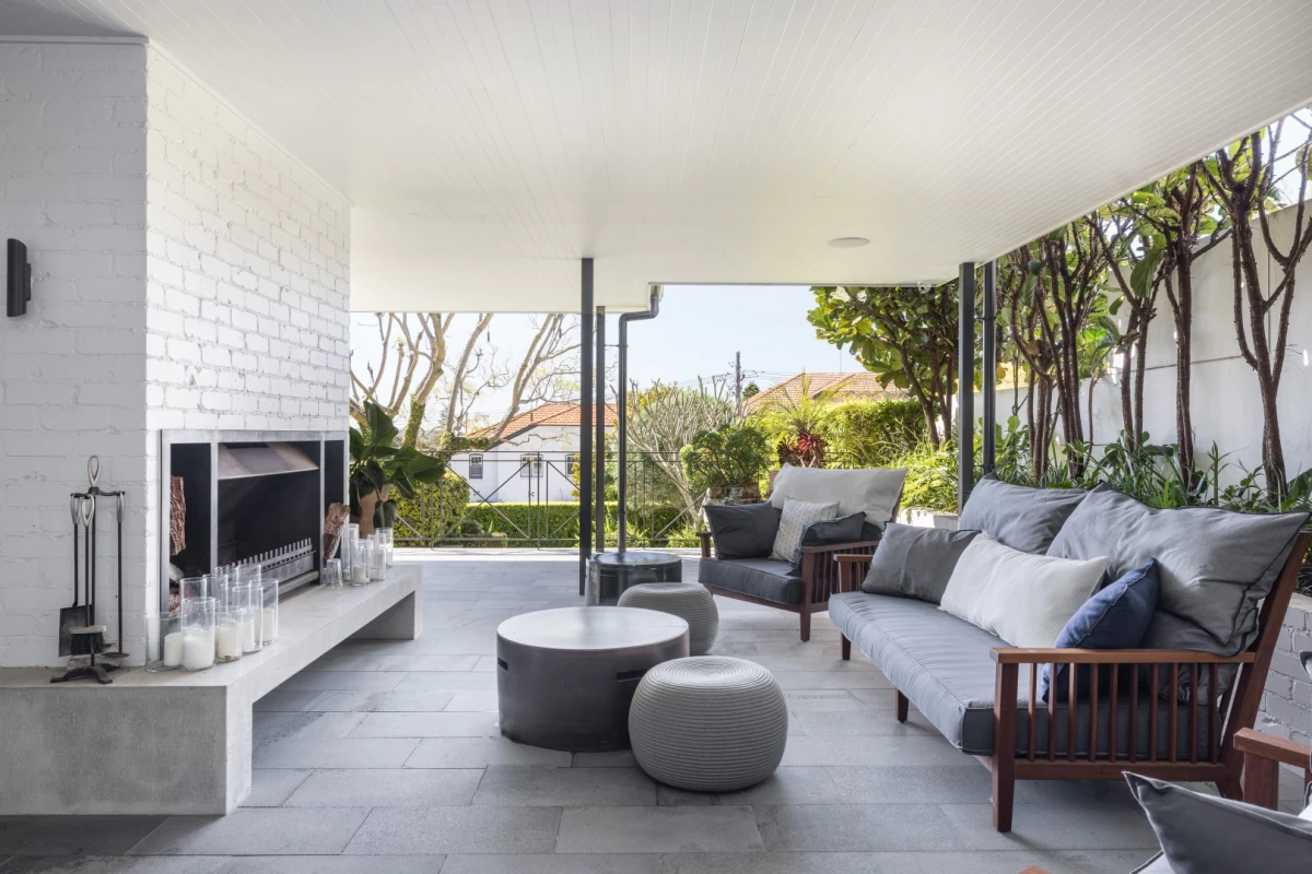 Covered outdoor living area with fireplace and comfy seating - 10 Redan Street, Mosman, NSW 2088