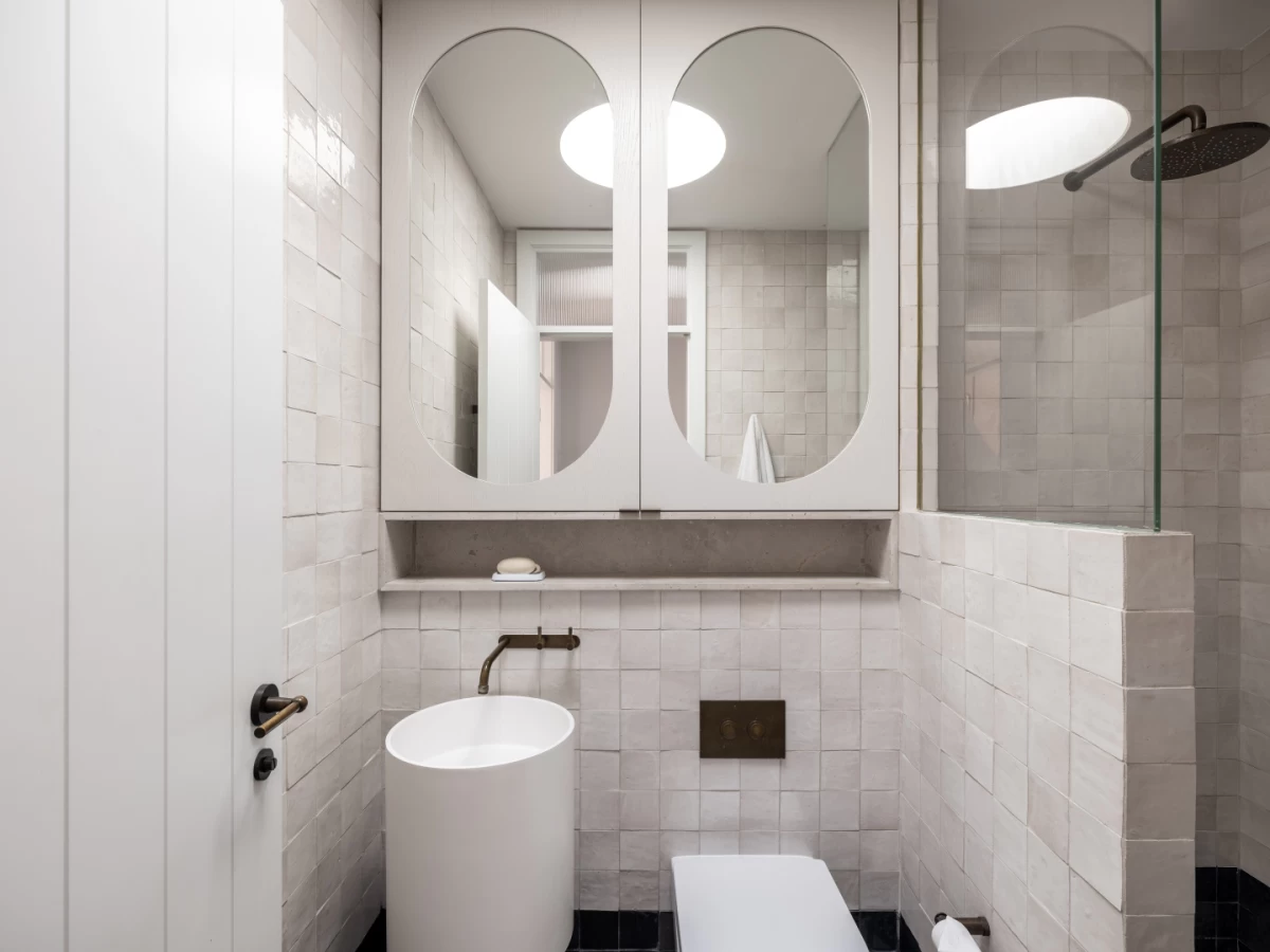 Compact bathroom with round mirrors and modern fixtures - 10 Redan Street, Mosman, NSW 2088