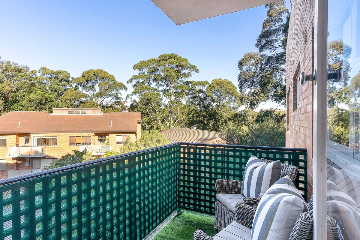 A cozy 1.5 x 2.4m balcony accessible from the living area with clear views and safety railing - 11/382 Mowbray Road, Lane Cove, NSW 2066