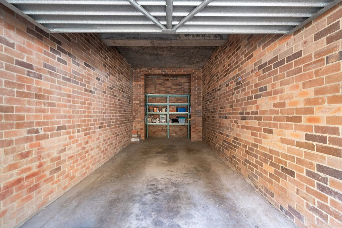 Spacious garage with built-in shelving for storage - 12/39 Helen Street, Lane Cove, NSW 2066