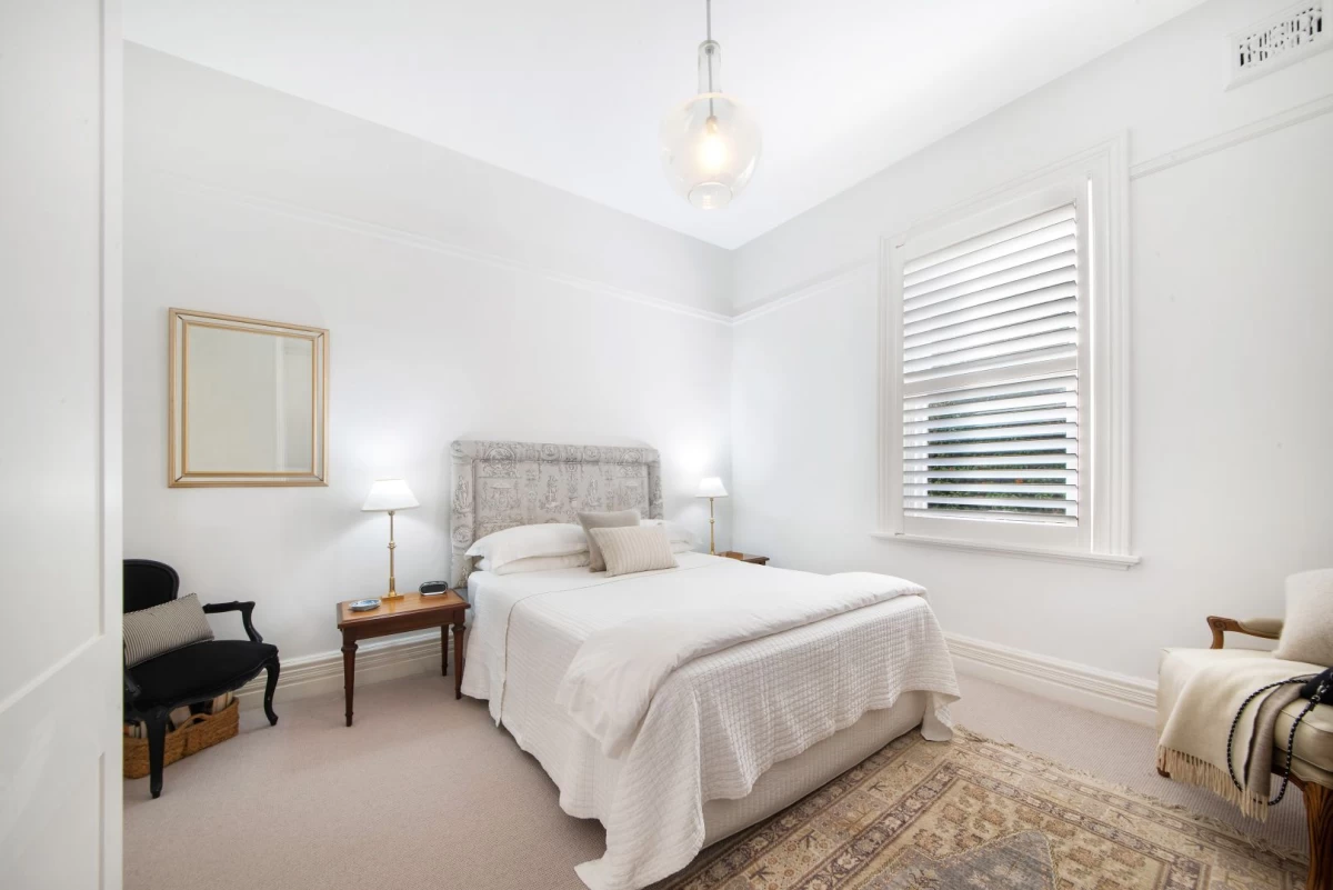 Simple and spacious bedroom with ample light from the window. - 127 Avenue Road, Mosman, NSW 2088