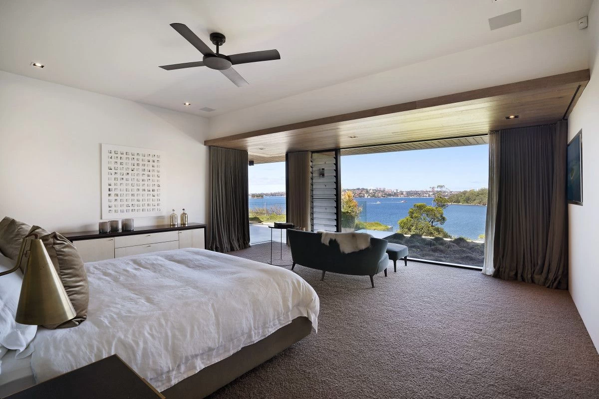 Large bedroom with extensive water views and direct balcony access - 16 Iluka Road, Mosman, NSW 2088