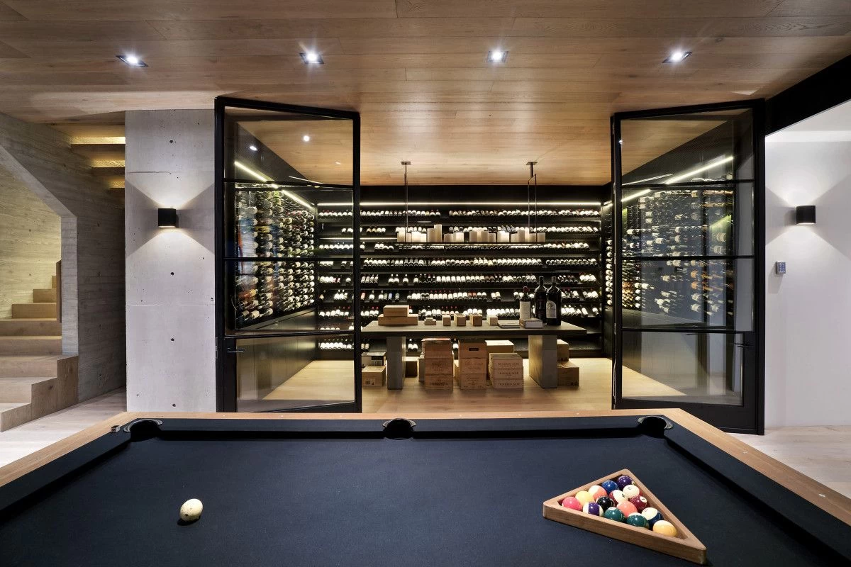 Games room featuring a billiard table and a glass-enclosed wine cellar - 16 Iluka Road, Mosman, NSW 2088