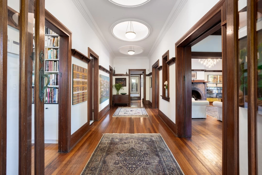 Central hallway leading to multiple rooms with wide, spacious layout - 215A Spit Road, Mosman, NSW 2088