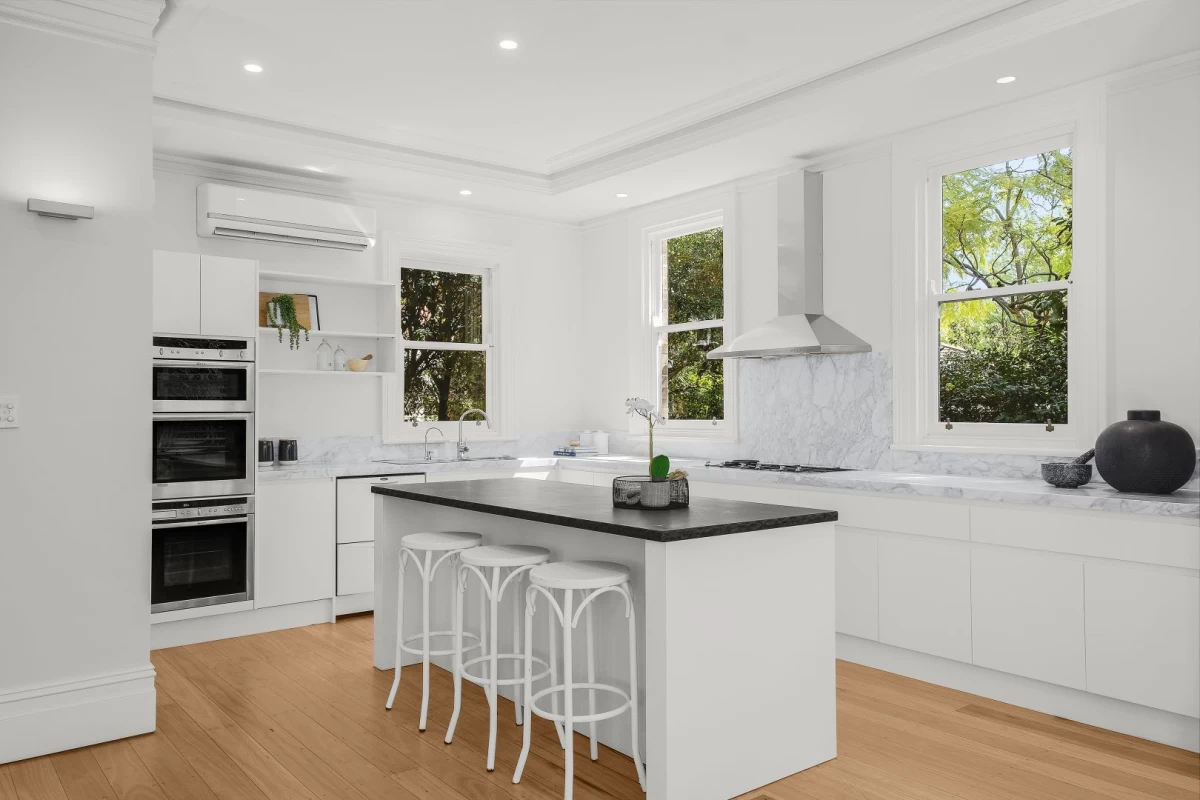 Modern kitchen with island bench, dual ovens, and plenty of natural light - 248 Longueville Road, Lane Cove, NSW 2066