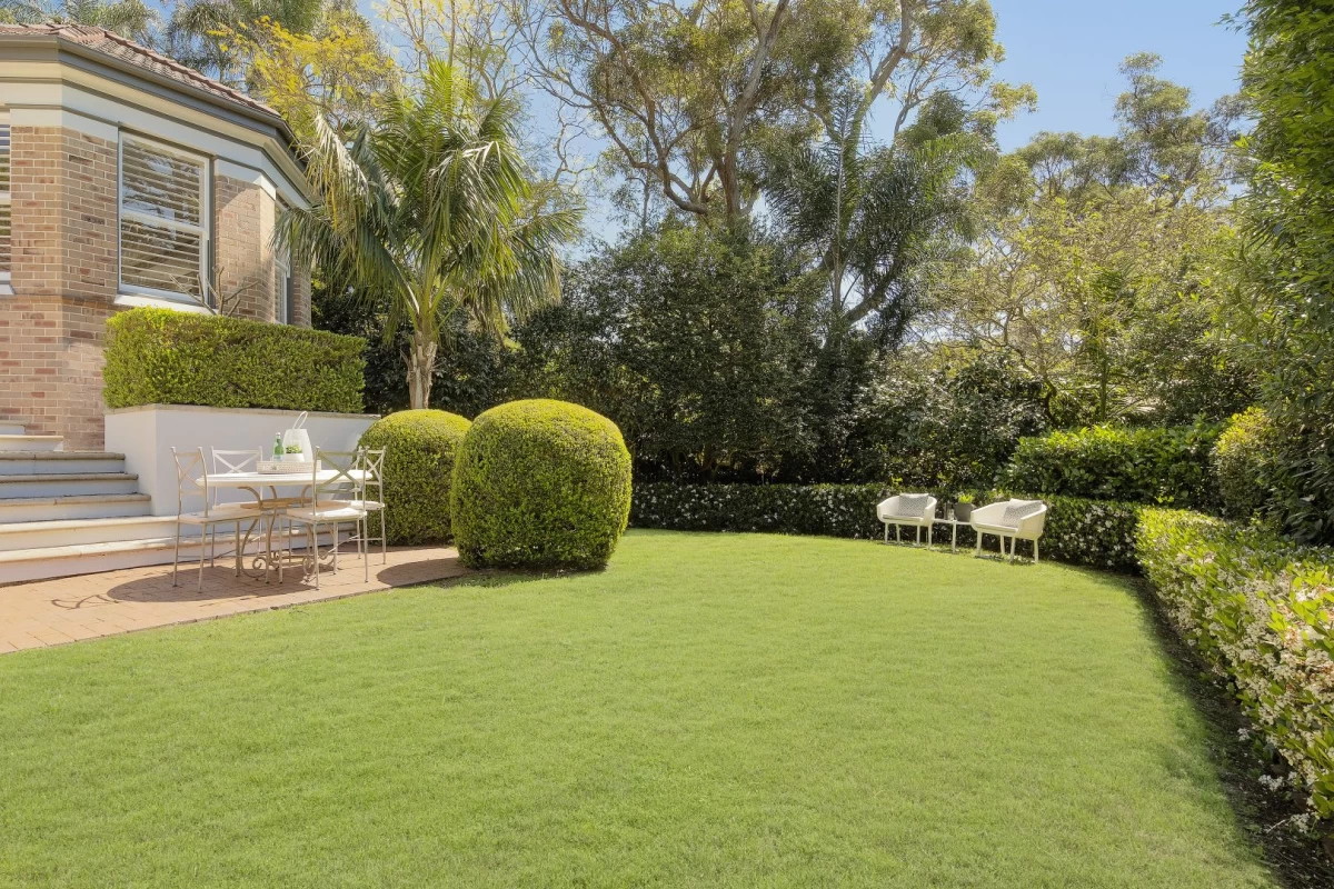 Spacious backyard with a lawn and patio area - 248 Longueville Road, Lane Cove, NSW 2066