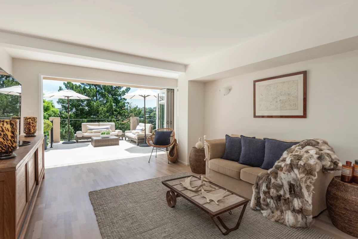 Indoor-outdoor living room flowing into the patio area - 25 Wyong Road, Mosman, NSW 2088