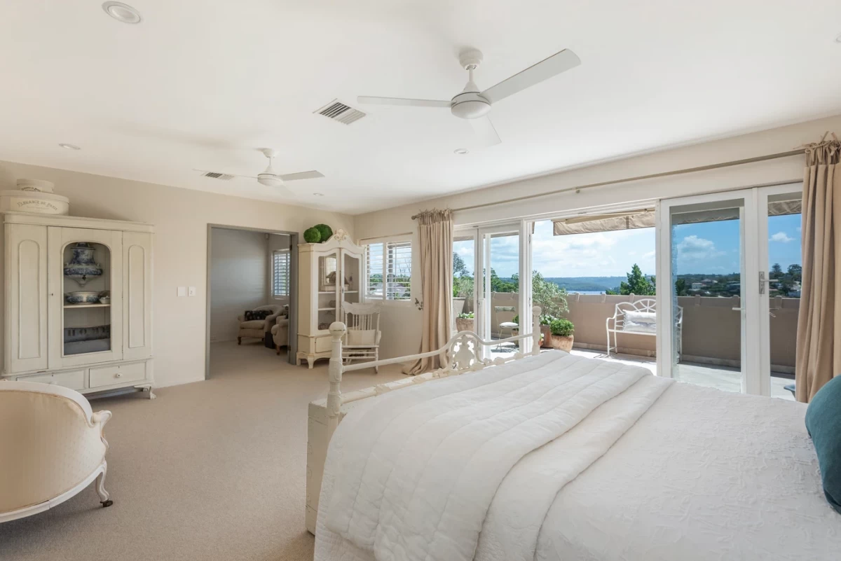 Spacious master bedroom with balcony access and large windows - 25 Wyong Road, Mosman, NSW 2088