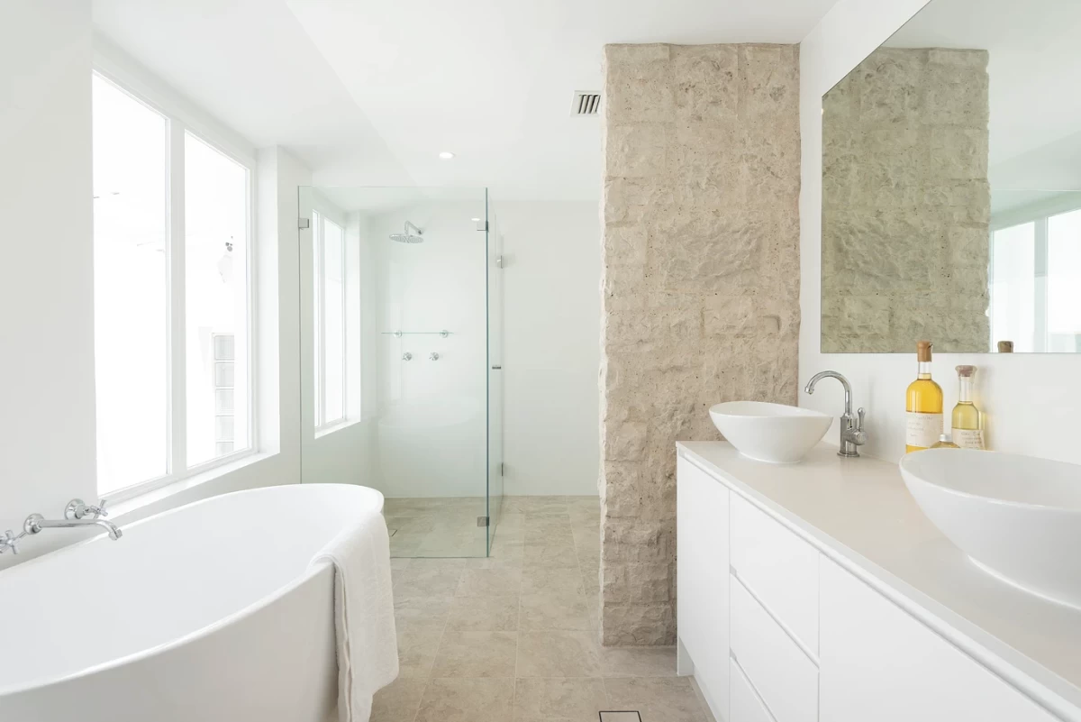 Modern bathroom with a bathtub and plenty of natural light - 25 Wyong Road, Mosman, NSW 2088