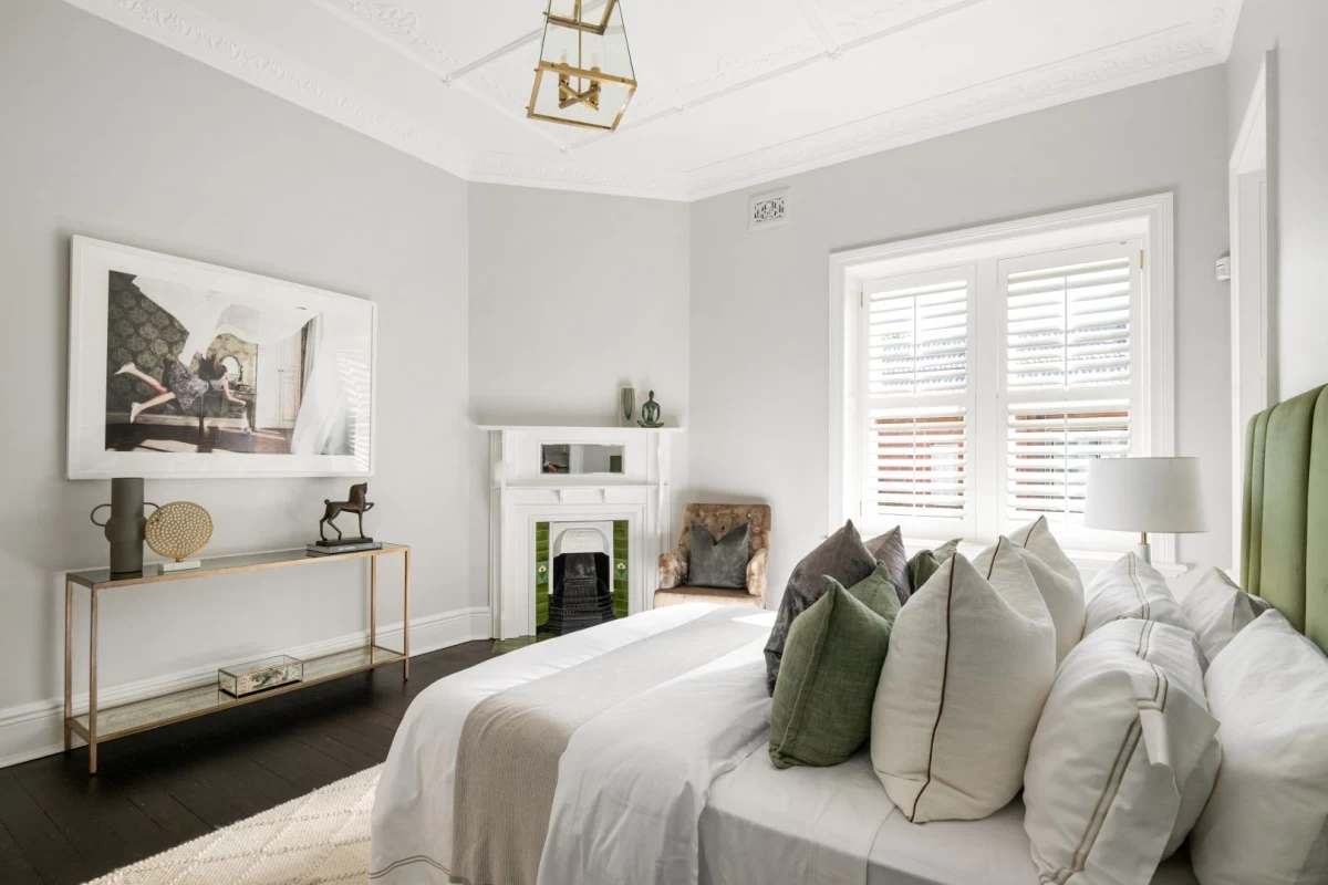 Bright bedroom with a fireplace and built-in shelves for storage - 3 Little Street, Mosman, NSW 2088