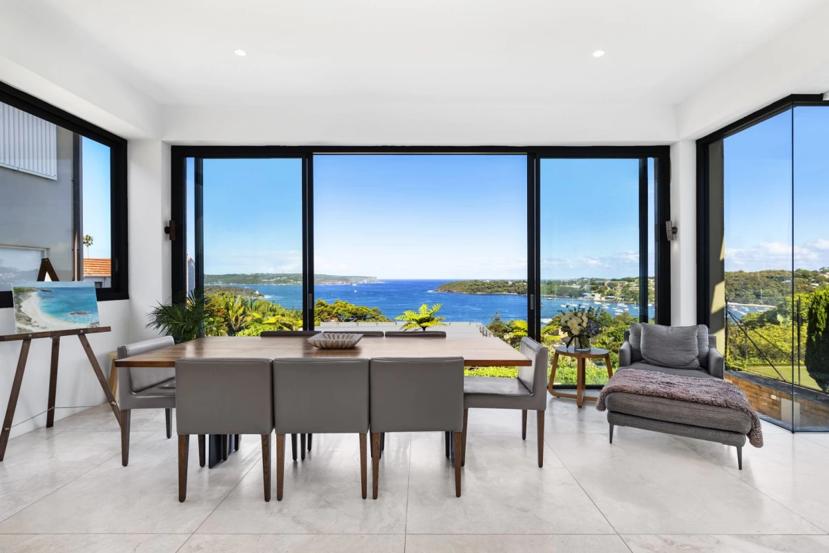 Dining area with large windows and beautiful ocean views - 31 Stanley Avenue, Mosman, NSW 2088