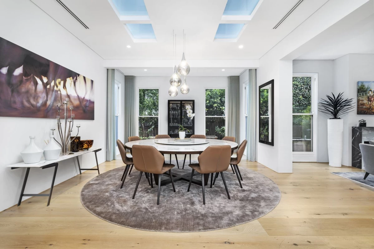 Bright dining area with a round table and large windows - 31 Stanley Avenue, Mosman, NSW 2088