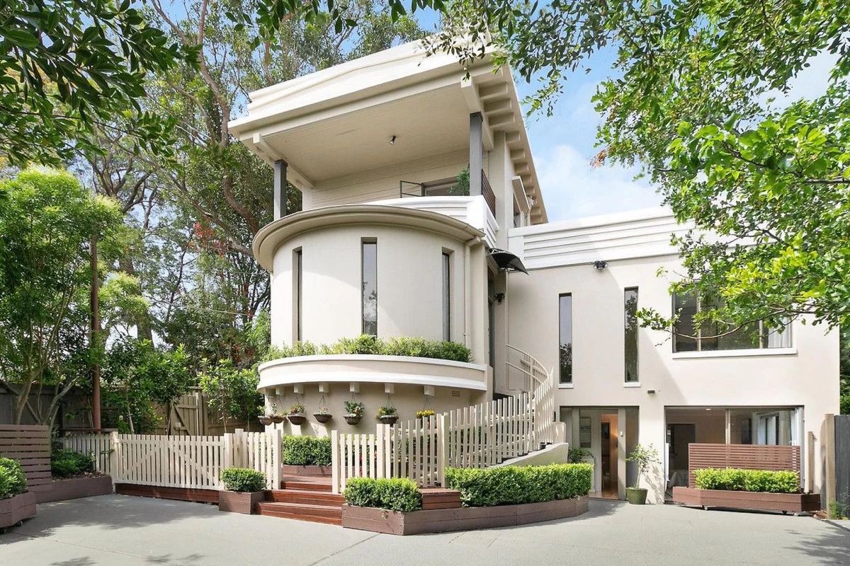 Unique, rounded design with a small porch and neat wooden fence - 32 Phoenix Street, Lane Cove, NSW 2066