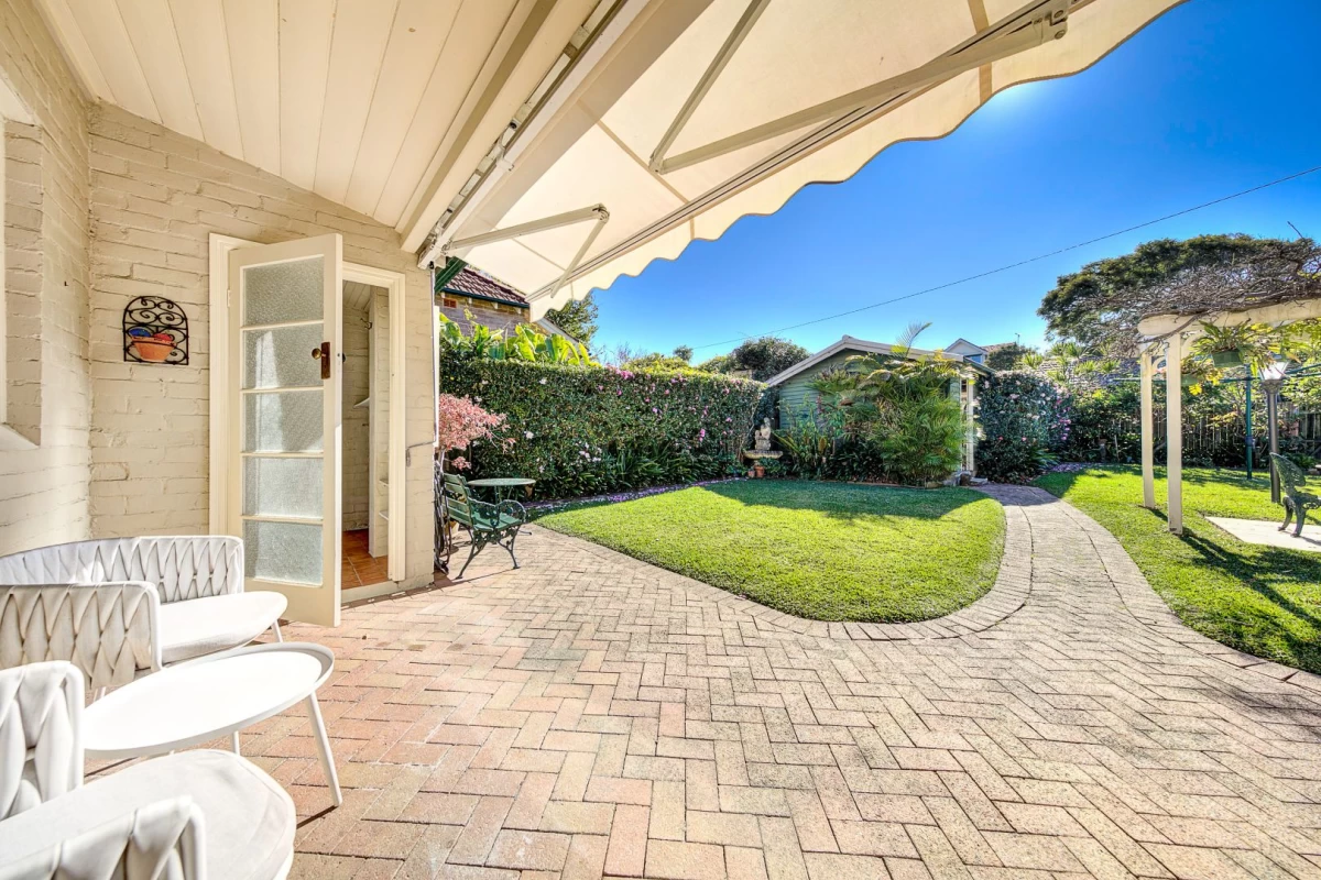 Patio with paved flooring leading to a lush garden - 39 Cabramatta Road, Mosman, NSW 2088