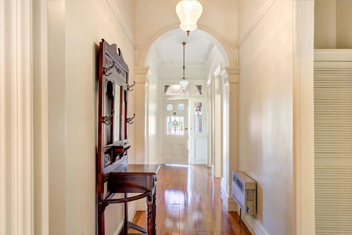 Long, narrow hallway with wooden floors and decorative ceiling lights - 39 Cabramatta Road, Mosman, NSW 2088