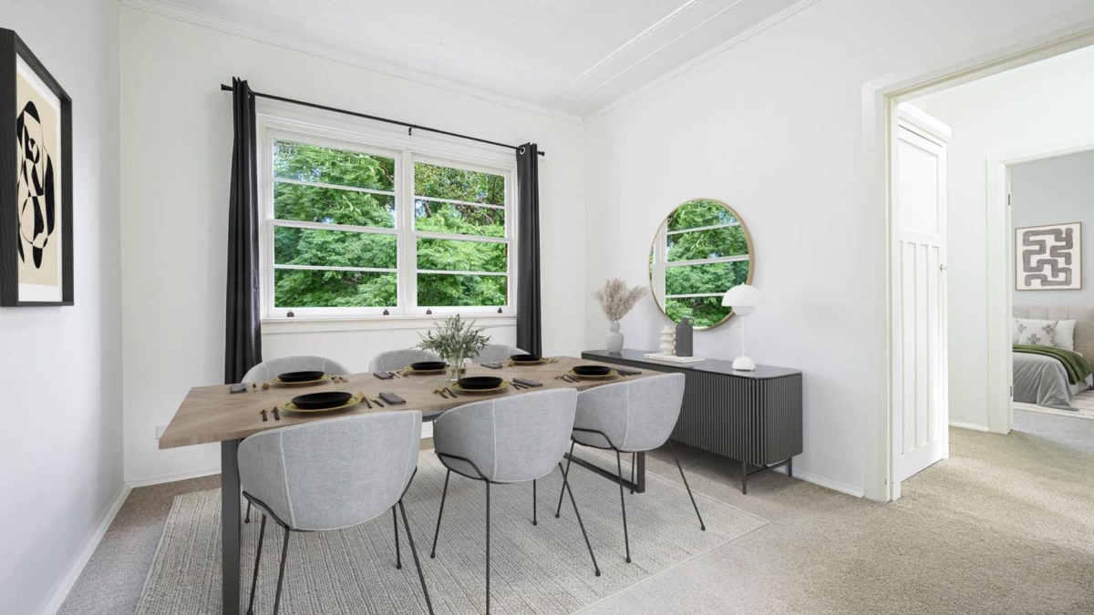 Spacious dining room with a large window and neutral walls - 4 Morrice Street, Lane Cove, NSW 2066