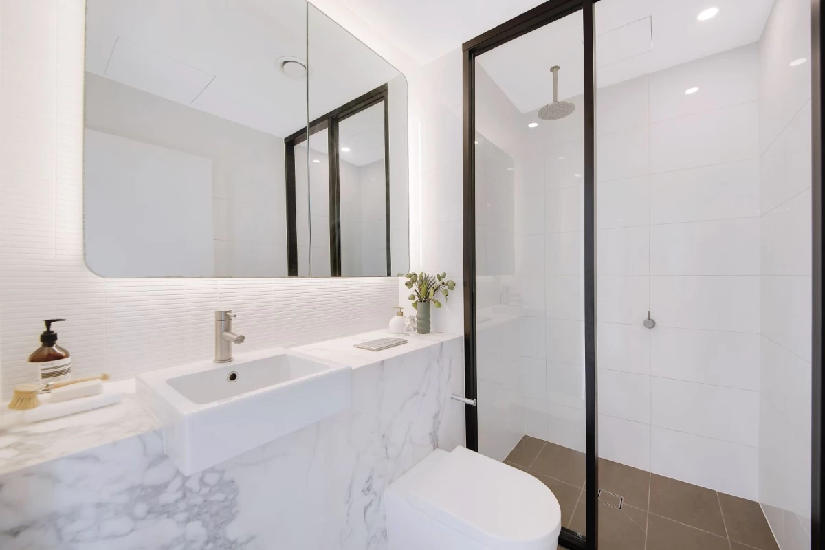 Elegant bathroom with a spacious shower and efficient layout - 401/116 Belmont Road, Mosman, NSW 2088