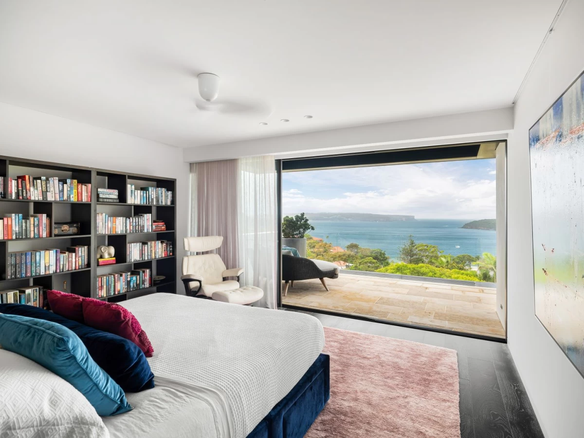 A bedroom with a stunning ocean view and access to outdoor space - 46 The Grove, Mosman, NSW 2088