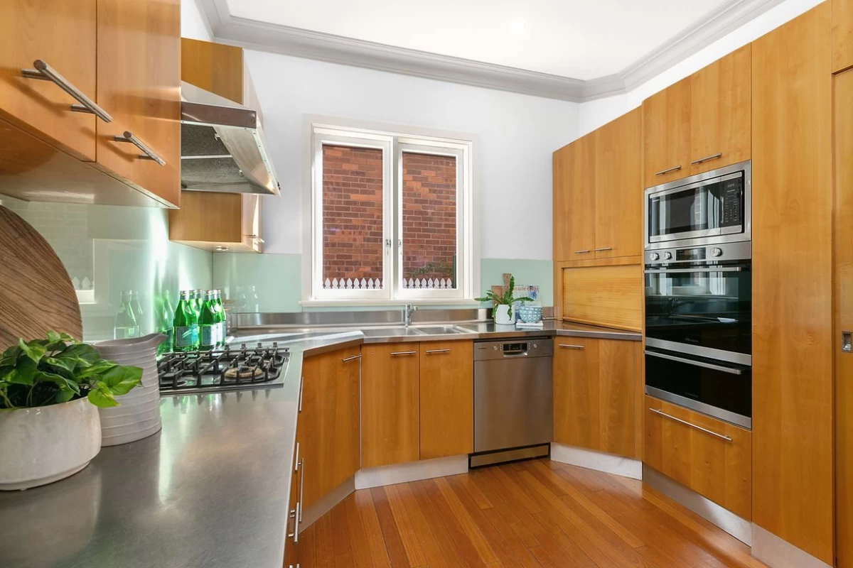 Compact and organised kitchen with modern appliances and ample storage - 47 Kimberley Avenue, Lane Cove, NSW 2066