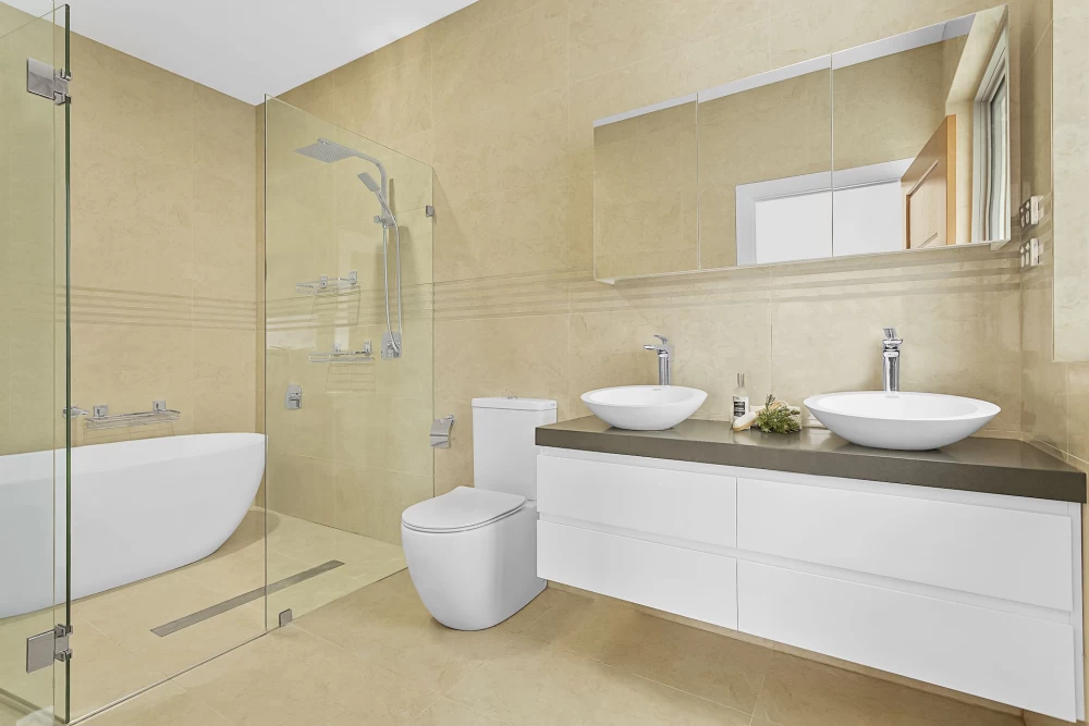 Modern bathroom with glass shower, bathtub, and dual sinks - 5 Cope Street, Lane Cove, NSW 2066