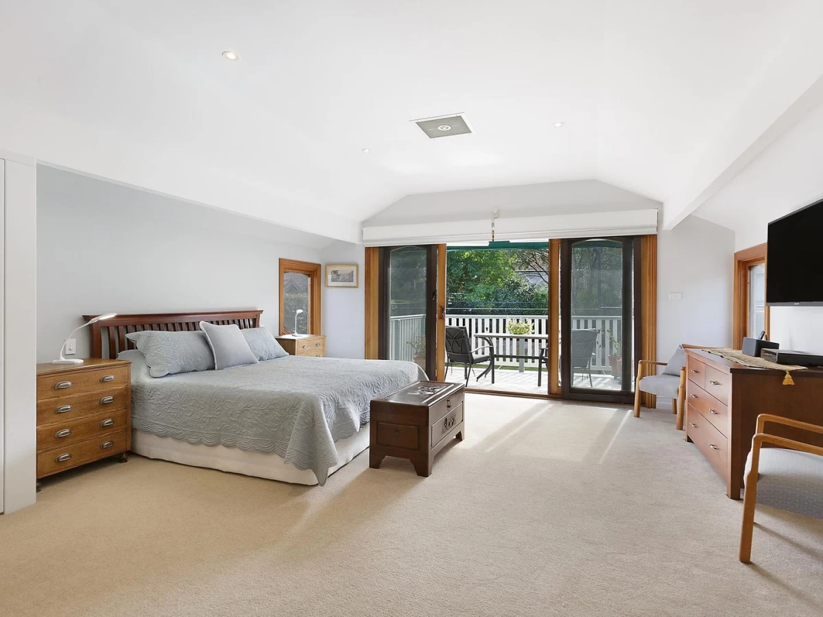 Spacious master bedroom with a private balcony and lots of natural light - 58 Phoenix Street, Lane Cove, NSW 2066