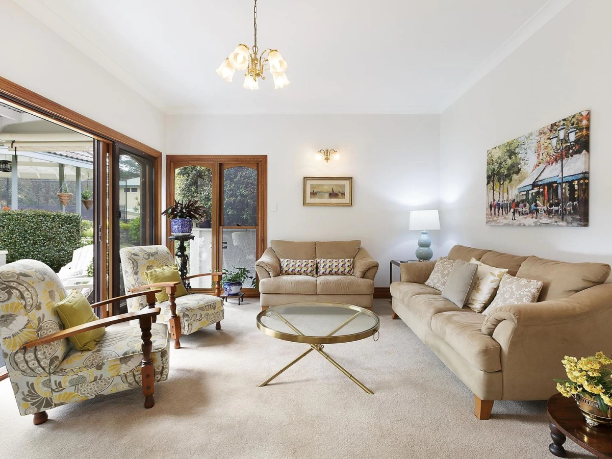 Cozy living room connected to the garden via large glass doors - 58 Phoenix Street, Lane Cove, NSW 2066