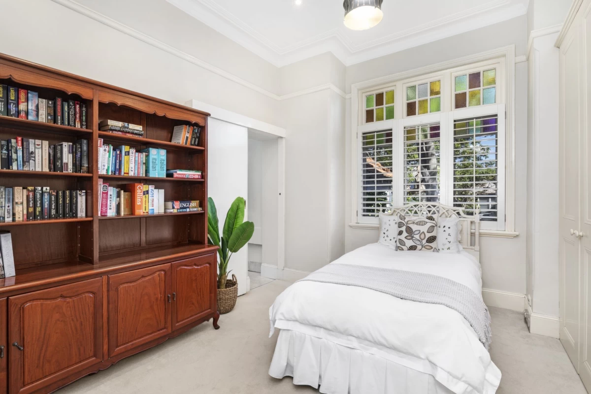 Bright bedroom with large bookshelves and natural light - 7 Melrose Street, Mosman, NSW 2088