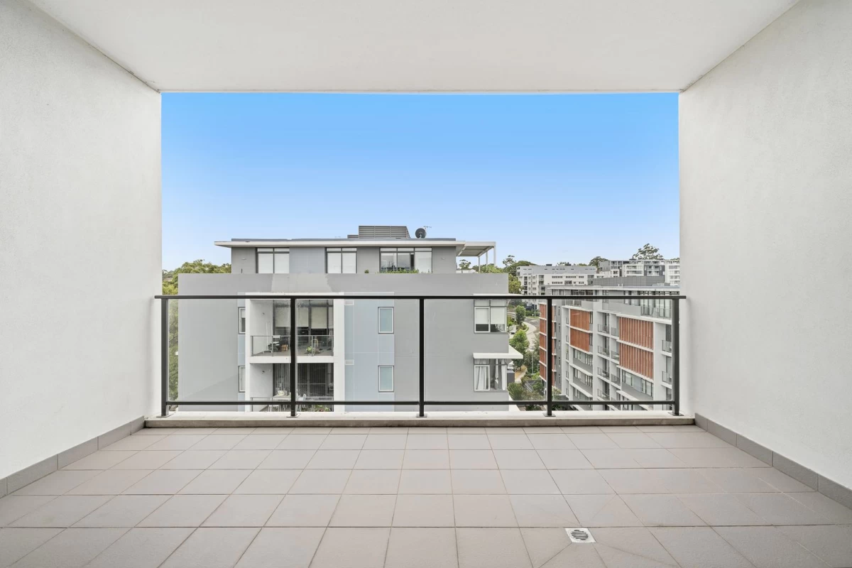 Open balcony with views of surrounding buildings and greenery - 704/10 Waterview Drive, Lane Cove, NSW 2066