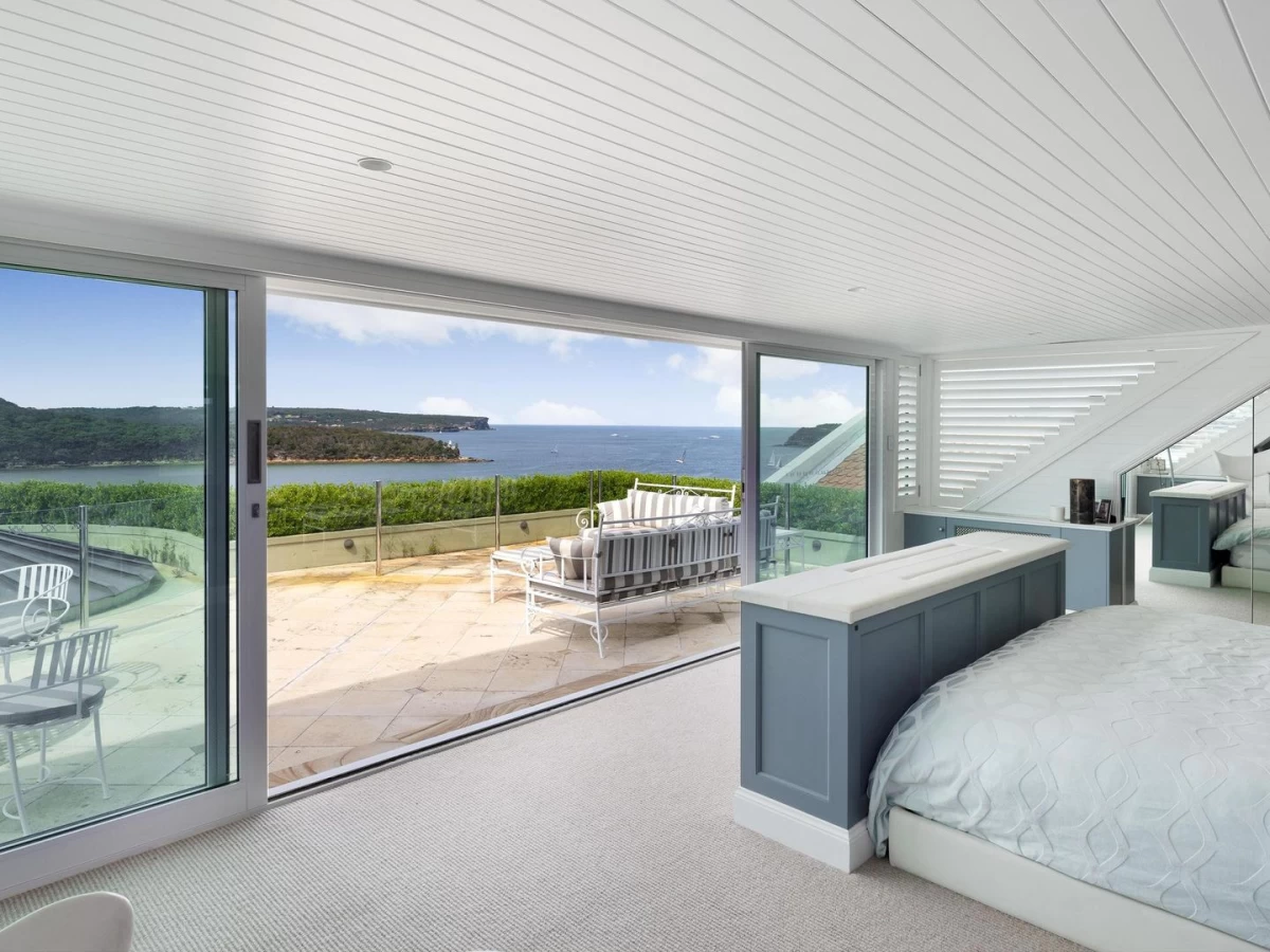 Bright master bedroom with large windows and balcony offering ocean views - 8 Burran Avenue, Mosman, NSW 2088