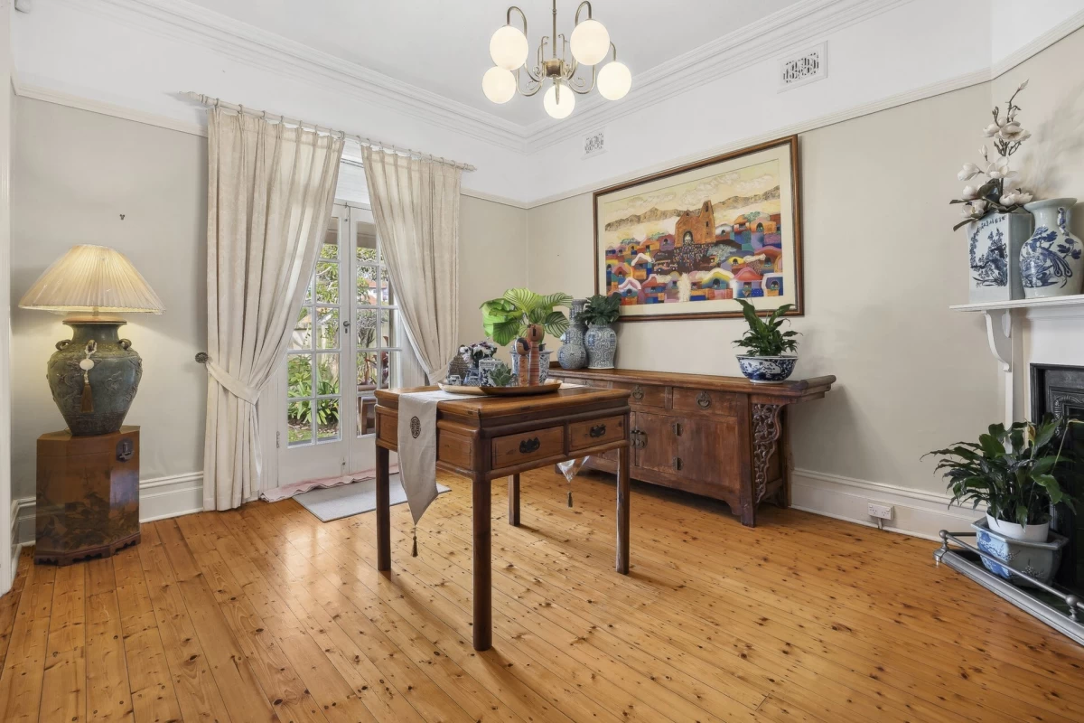 Elegant dining room with wooden floors and French doors to the garden - 98 Raglan Street, Mosman, NSW 2088